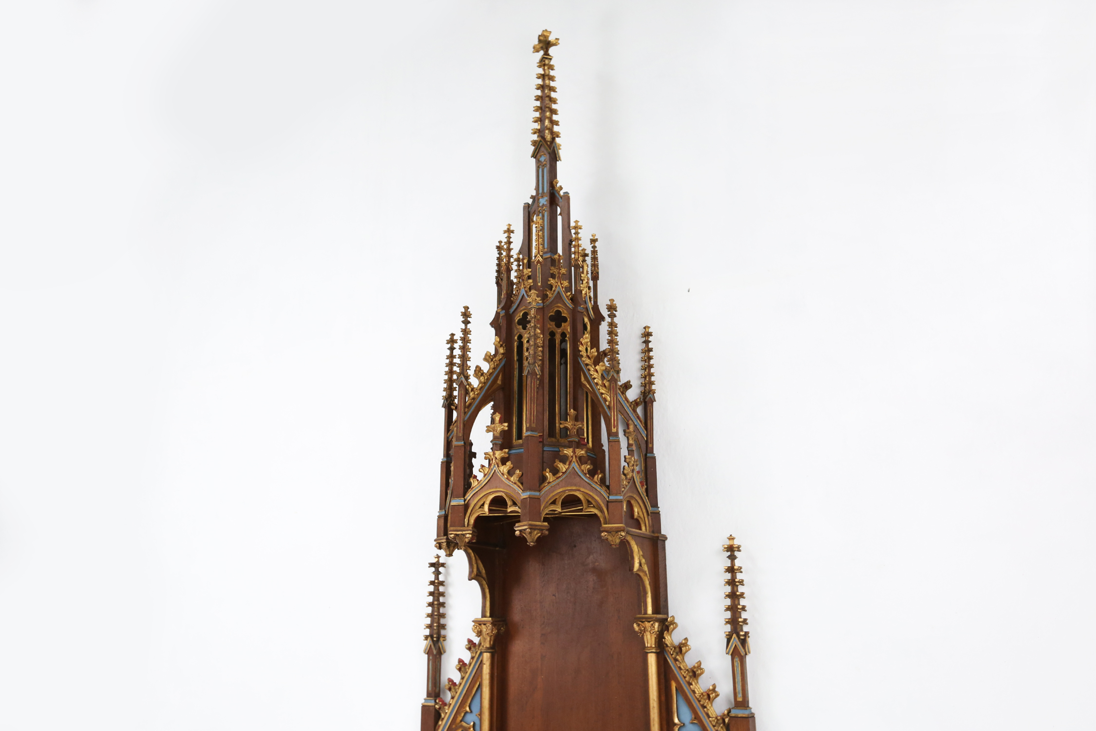 A French polychrome and gilt wooden neo-Gothic church steeple with niche for saint statue, ca. 1800thumbnail